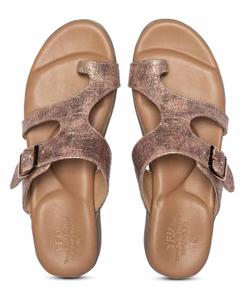Ortho flat feet sandals with arch support in rose gold color. This toe-separator sandal is designed to provide comfort and support for people with flat feet. The sandals have a supportive arch and a cushioned footbed that helps reduce foot fatigue. The rose gold straps and toe separator add a stylish touch to the design.