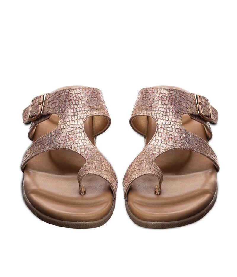 Ortho flat feet sandals with arch support in rose gold color. This toe-separator sandal is designed to provide comfort and support for people with flat feet. The sandals have a supportive arch and a cushioned footbed that helps reduce foot fatigue. The rose gold straps and toe separator add a stylish touch to the design.