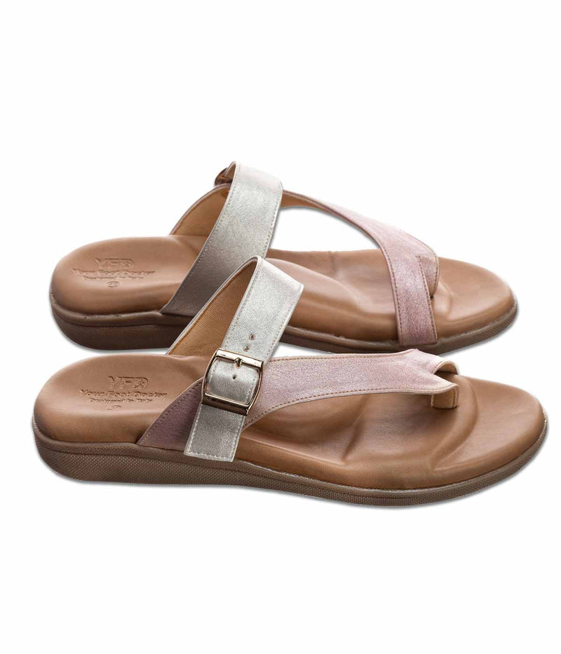 A comfortable and supportive sandal with a cushioned footbed and adjustable pink strap for a secure fit. Designed for individuals with flat feet, the sandal features built-in arch support to help alleviate pain and discomfort. Perfect for all-day wear, these sandals provide a stylish and practical solution for individuals seeking relief from flat foot-related issues."